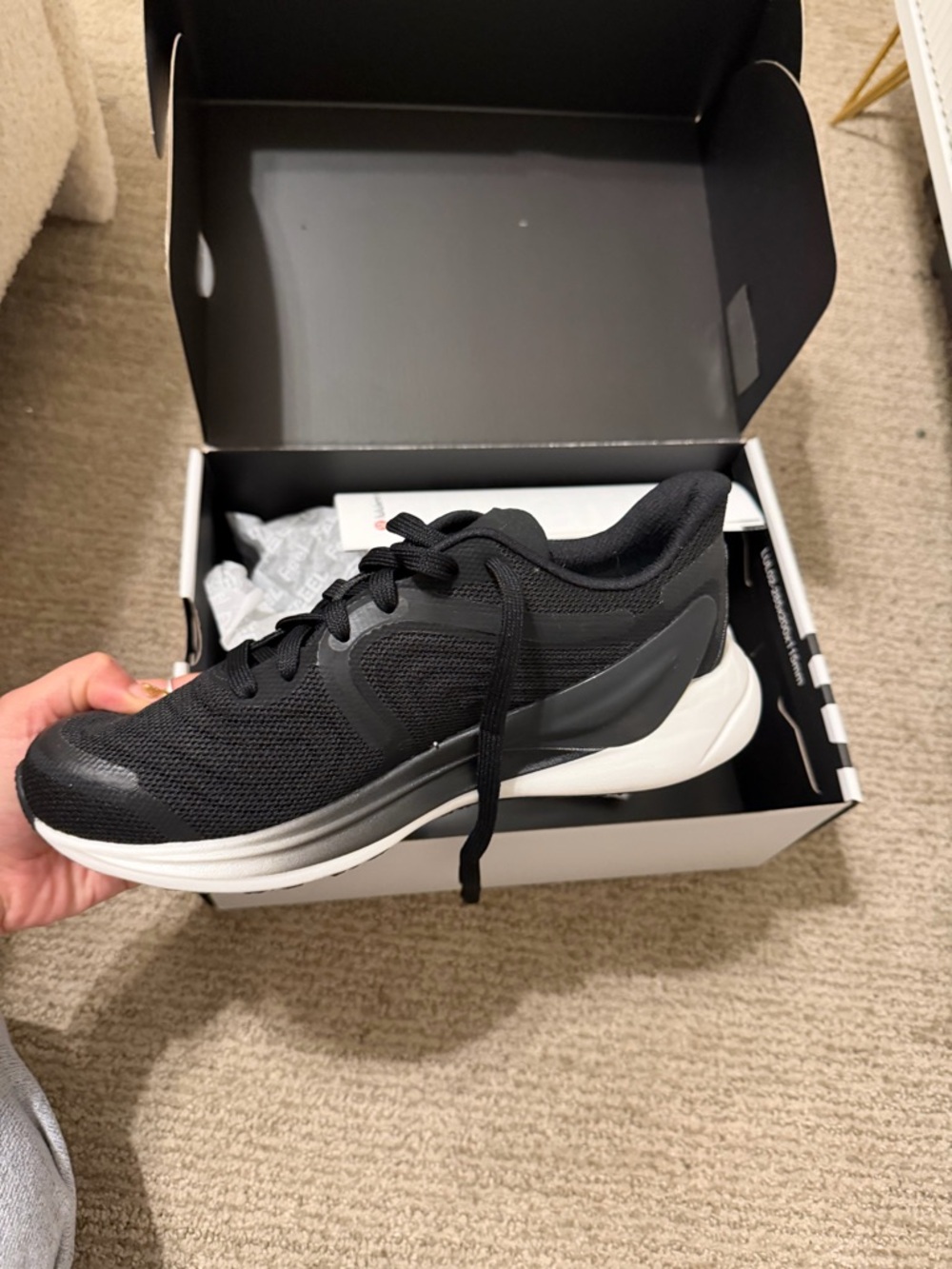 Men's Black Athletic Running Shoe with Cushioned White Sole